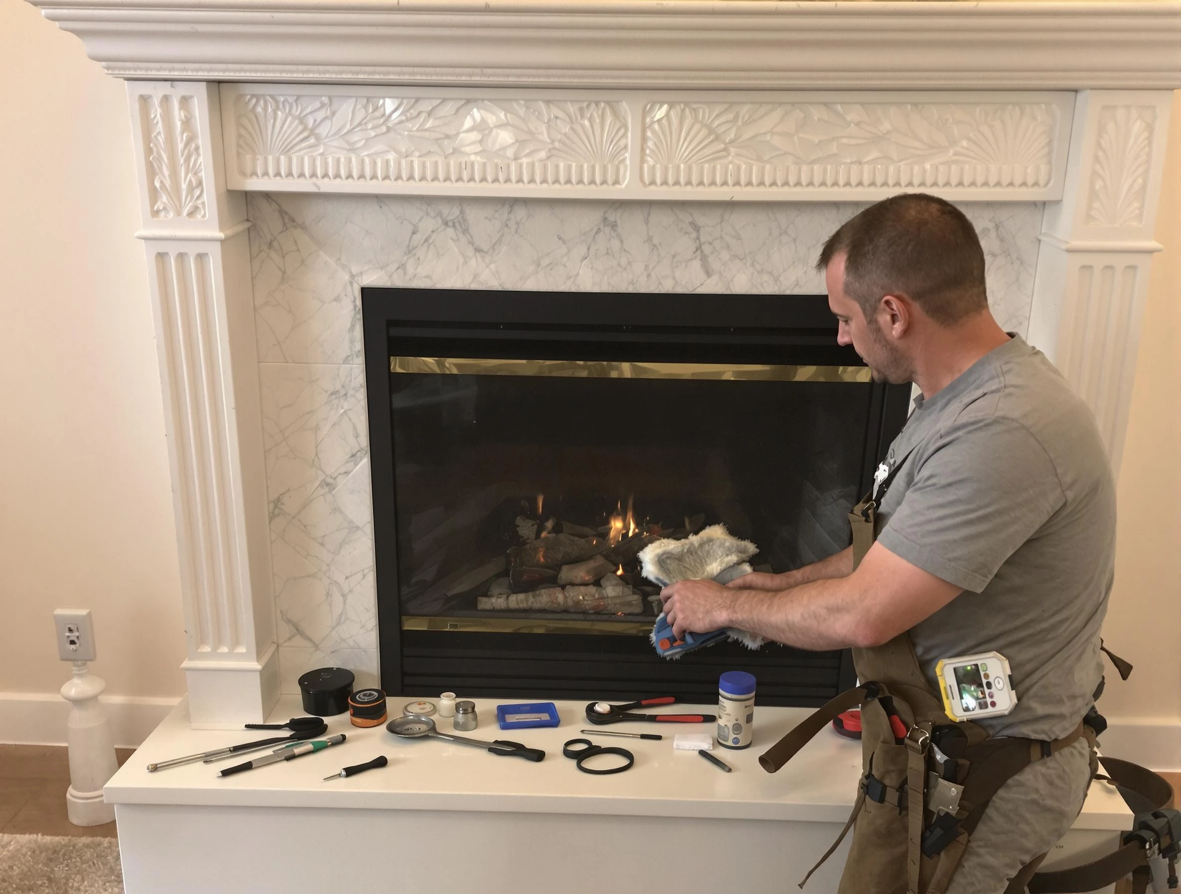 Medford Chimney Sweep performing fireplace maintenance in Medford, MA